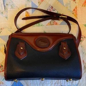 Classic Dooney and Bourke All weather leather handbag.